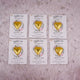 Set of six customized chocolate wedding favors for Nikah with gold heart chocolates and floral cards, perfect for Islamic wedding celebrations.