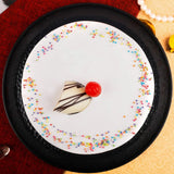 Vanilla Cake sliced to show the layers inside