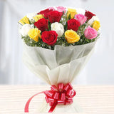 Modern Romance - Premium Mixed Rose Bouquet with red, yellow, white, and pink roses, wrapped in white paper and tied with a red ribbon.