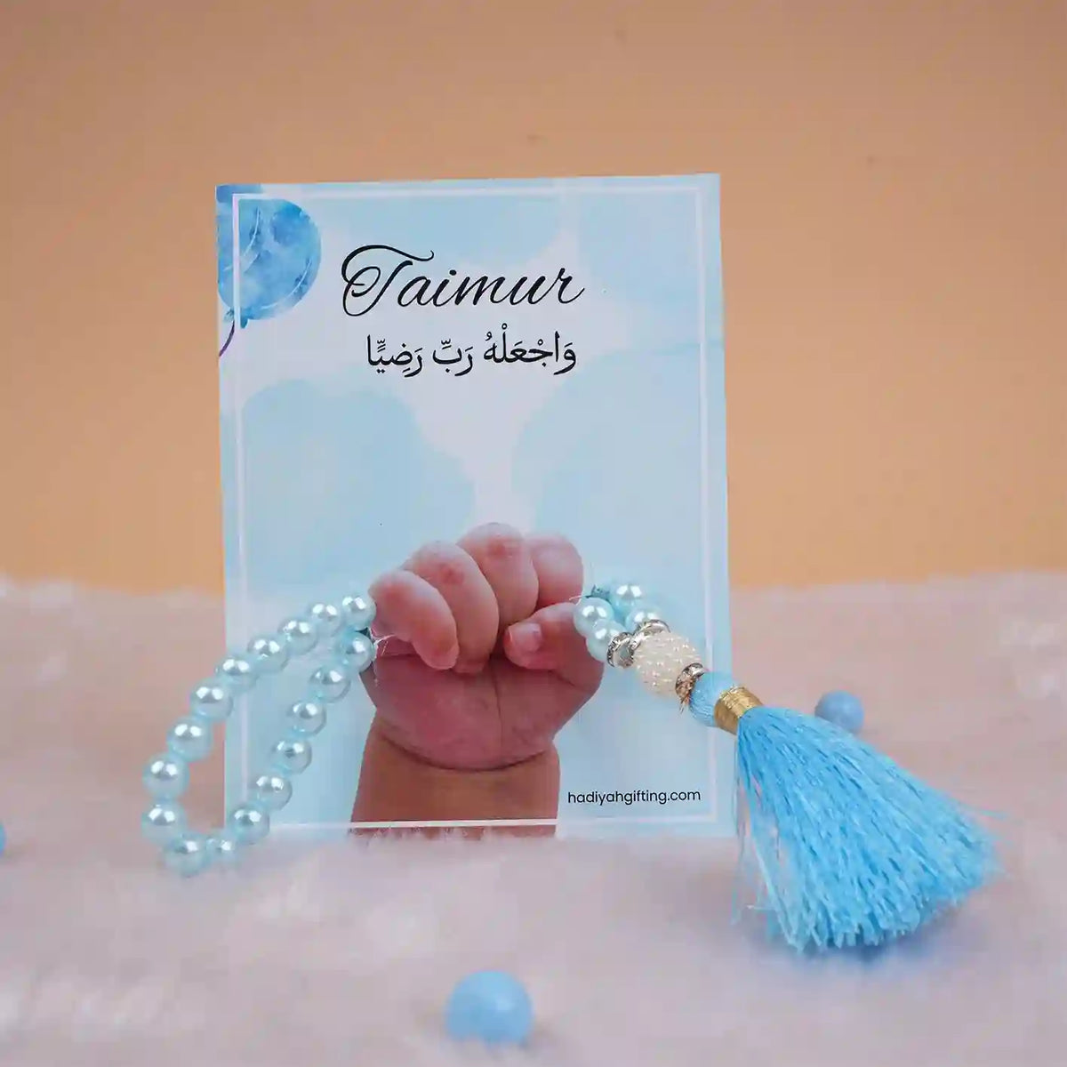 Blue Little Hands Tasbeeh Keepsake with name 'Taimur' on a personalized card, perfect for Aqiqah gifts in Religious & Ceremonial items.