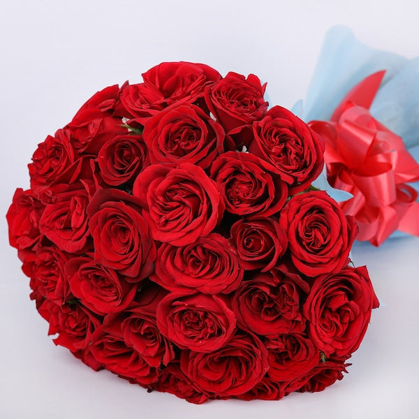 Classic Aura 12 Red Roses Bouquet shown from a different angle