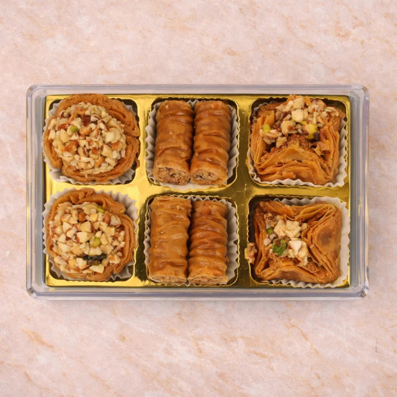 Decorative box of luxury Baklava sweets with nuts and syrup