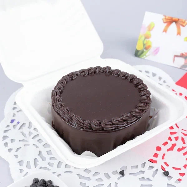 Mini Chocolate Round Shape Cake (300 gm) — front view, freshly baked