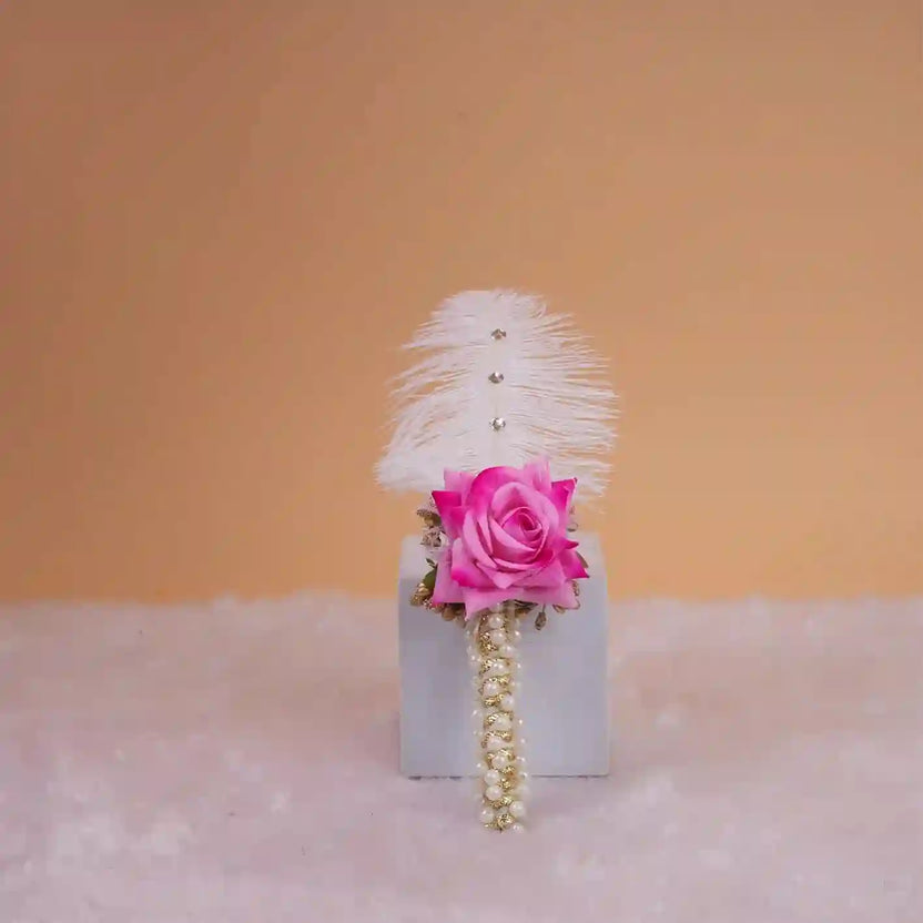 Nikah Pen with Pink Rose featuring white feather, pearl detailing, and floral embellishment, ideal for Islamic wedding ceremonies and bridal gifts. Main image