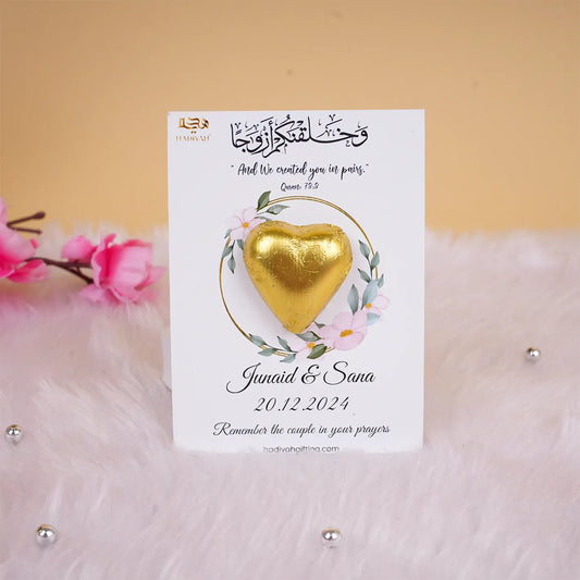 Personalized Nikah favor card with gold heart chocolate, Islamic verse, and wedding details of Junaid & Sana, ideal for Muslim wedding gifts.