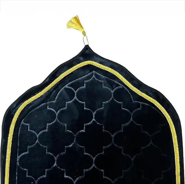 Black Dome Janamaz with golden trim and tassel, showcasing elegant dome shape and luxurious texture for premium prayer experience.