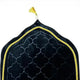 Black Dome Janamaz with golden trim and tassel, showcasing elegant dome shape and luxurious texture for premium prayer experience.