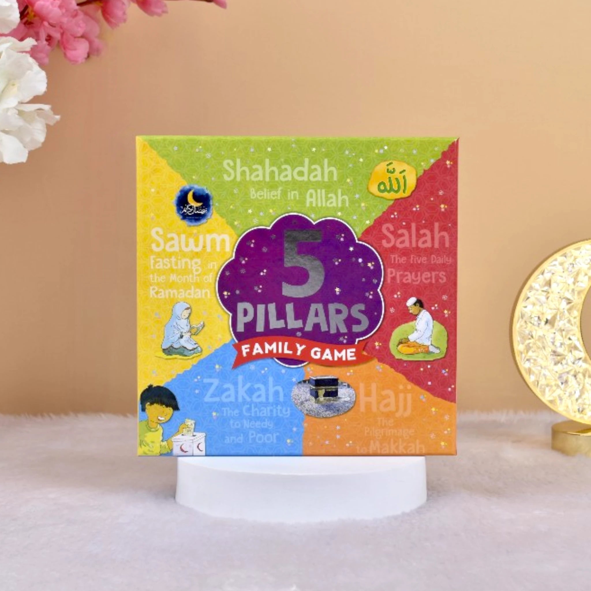Five Pillars Games - Islamic Learning Game box cover featuring colorful illustrations of Shahadah, Salah, Sawm, Zakah, and Hajj for kids. Main image