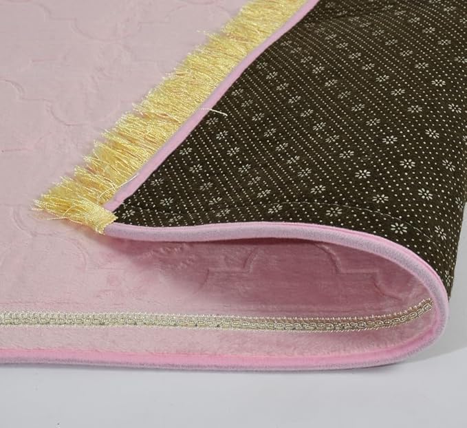 Underside of Pink Dome Janamaz showing non-slip dark patterned base and soft velvet top, ideal for travel and daily prayer.