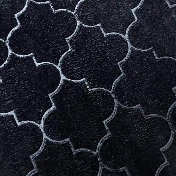Close-up of Black Dome Janamaz fabric showing intricate dome-shaped pattern and soft velvet texture for comfortable prayer experience.