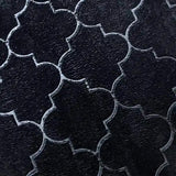 Close-up of Black Dome Janamaz fabric showing intricate dome-shaped pattern and soft velvet texture for comfortable prayer experience.