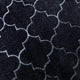Close-up of Black Dome Janamaz fabric showing intricate dome-shaped pattern and soft velvet texture for comfortable prayer experience.
