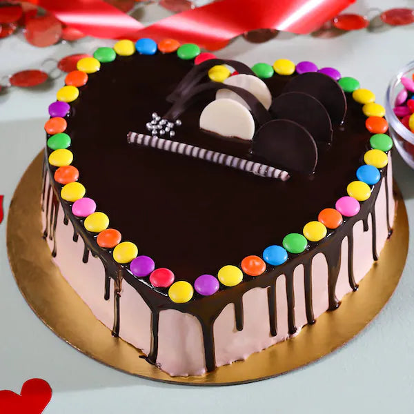 Sprinkled Gems Cake - Colorful Gems Cake with heart shape, chocolate glaze, and rainbow candy topping, ideal for parties and same day delivery. Main image