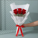 6 Red Roses Bouquet — detail of the flowers and wrapping