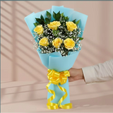 6 Yellow Roses Bouquet arranged in packaging, close-up