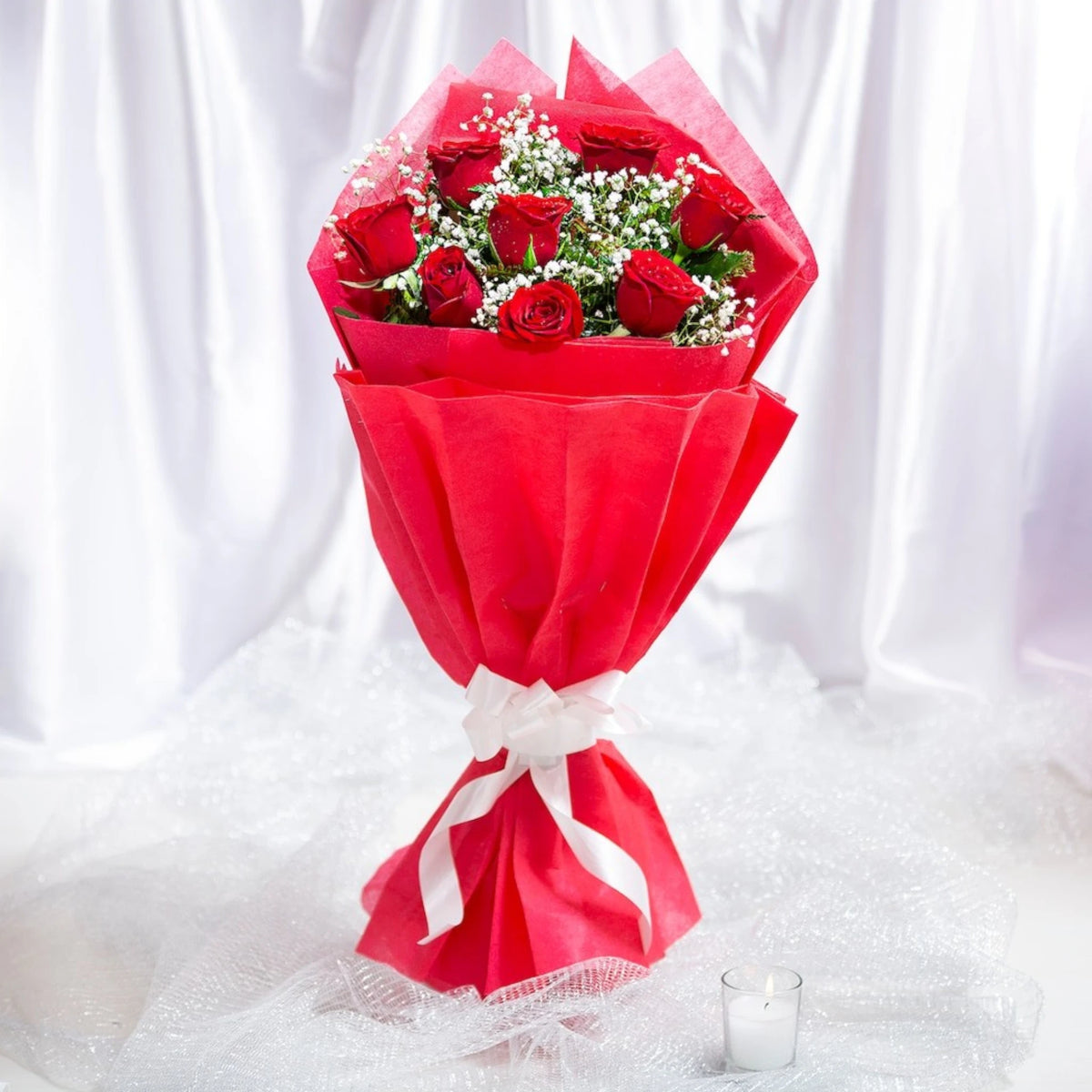 Elegant 8 Red Roses Bouquet standing upright with white ribbon, perfect for expressing love and passion on anniversaries or special dates.
