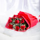 Red Roses Bouquet with 8 fresh roses and baby's breath, wrapped in red paper. Ideal for romantic occasions and same day delivery gifts.
