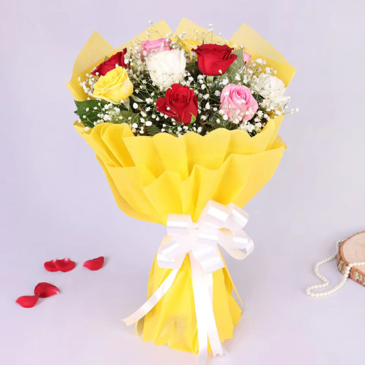 Elegant Mix Roses Bunch arranged in packaging, close-up
