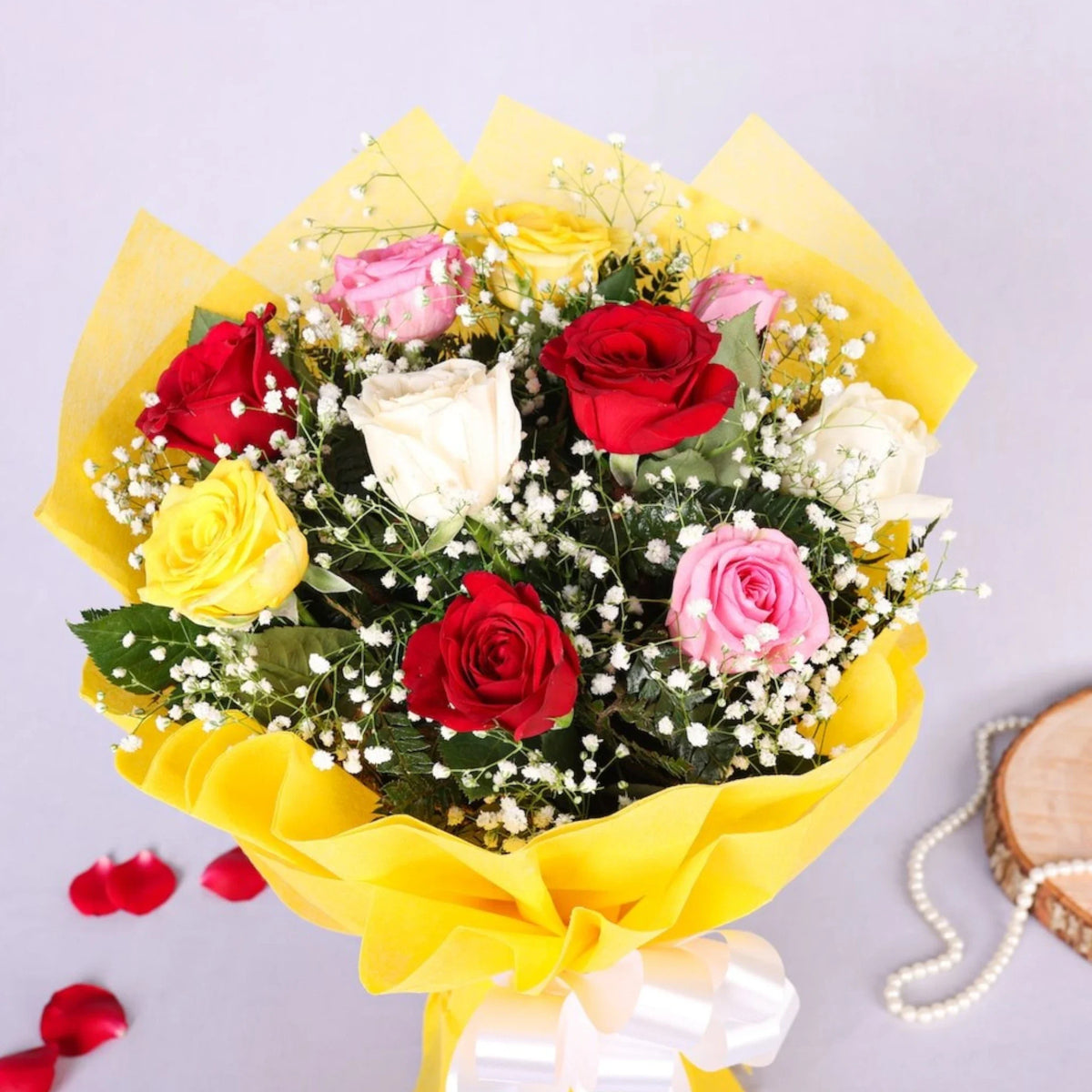 Elegant Mix Roses Bunch featuring colorful roses and baby's breath in yellow wrap, perfect for anniversaries, birthdays, or same day delivery gifts.