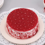 Moist & creamy Classic Mini Red Velvet Cake - 300gm topped with red crumbs and pearls, ideal for small celebrations and same day delivery.