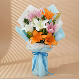 8 Mixed Asiatic Lilies Bouquet arranged in packaging, close-up