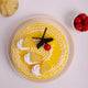 Top view of Tropical Bliss Pineapple Cake featuring vibrant yellow swirl design, fresh pineapple chunks, whipped cream, and cherry garnish.