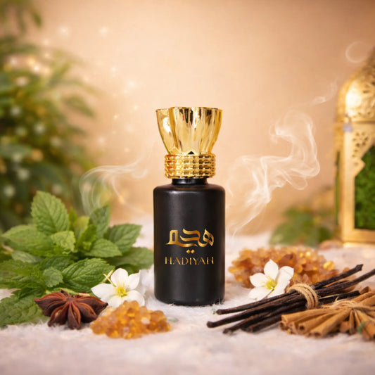 Arba Warbat - Luxury attar perfume in a black and gold bottle with natural ingredients like mint, vanilla, and cinnamon. Alcohol-free fragrance for daily wear.