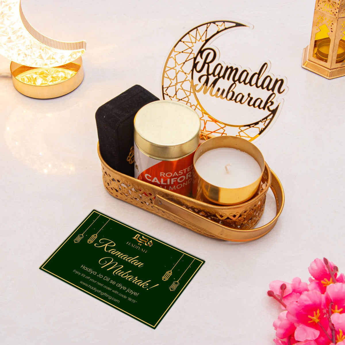 Ameen Luxe Ramadan Hamper with black tasbih box, candle, almonds, and Ramadan Mubarak card in gold tray. Ideal premium Ramadan gift.