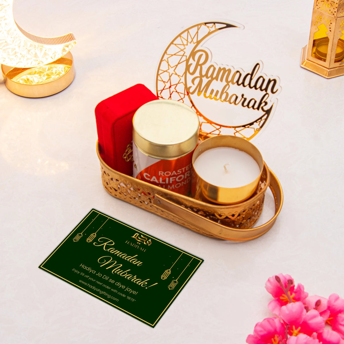 Ameen Luxe Ramadan Hamper with red tasbih box, candle, almonds, and Ramadan Mubarak greeting card in gold tray. Perfect Ramadan gift idea.
