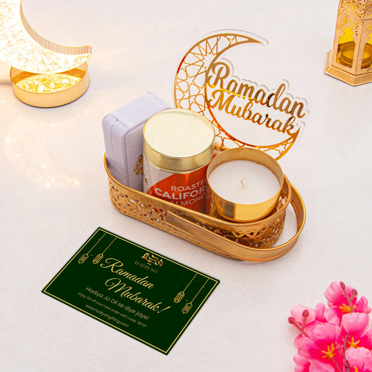 Ameen Luxe Ramadan Hamper with white tasbih box, candle, almonds, and Ramadan Mubarak greeting card in gold tray. Thoughtful Ramadan gift.
