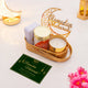 Ameen Luxe Ramadan Hamper with white tasbih box, candle, almonds, and Ramadan Mubarak greeting card in gold tray. Thoughtful Ramadan gift.
