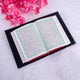Open Quran with black velvet cover from the Black Sequence Rehal Hamper - part of a luxury Islamic gift set.