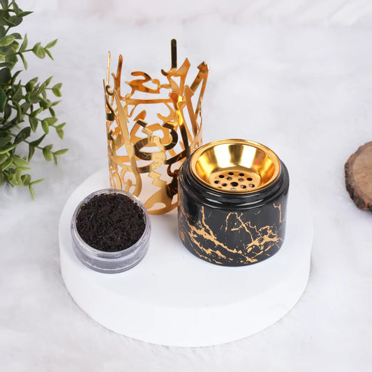 Luxury black marble Bakhoor container with gold accents and incense for home decor