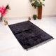 Black velvet janamaz with intricate design from the Sawab-E-Jariya Gift Hamper. Soft prayer mat for daily salah and gifting.