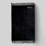 Personalized Black Janamaz with Name - Custom Black Prayer Rug embroidered with 'Madiha', made of plush velvet, ideal for religious gifting.