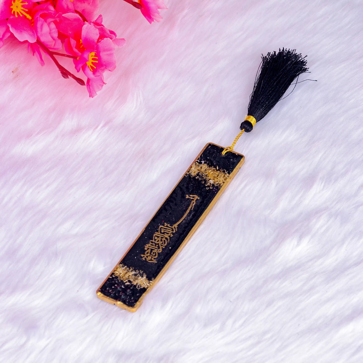Elegant black and gold Islamic bookmark with tassel from the Black Sequence Rehal Hamper - ideal for Quran reading.