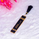 Handmade Resin Quran Bookmark in black and gold with tassel, part of the Black Rehal & Bookmark - The Bling Collection gift set.
