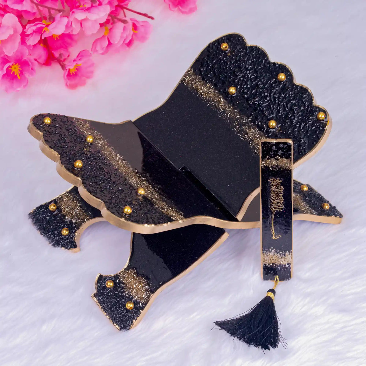 Black and gold Quran rehal with matching bookmark from the Bling Collection. Premium accessory for religious gifting occasions.