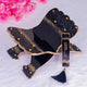 Black and gold Quran rehal with matching bookmark from the Bling Collection. Premium accessory for religious gifting occasions.