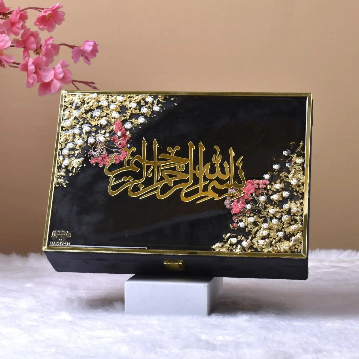 Designer black box with golden Arabic calligraphy from Bridal Hamper Velvet Quran set. Elegant packaging for Islamic bridal gifts.