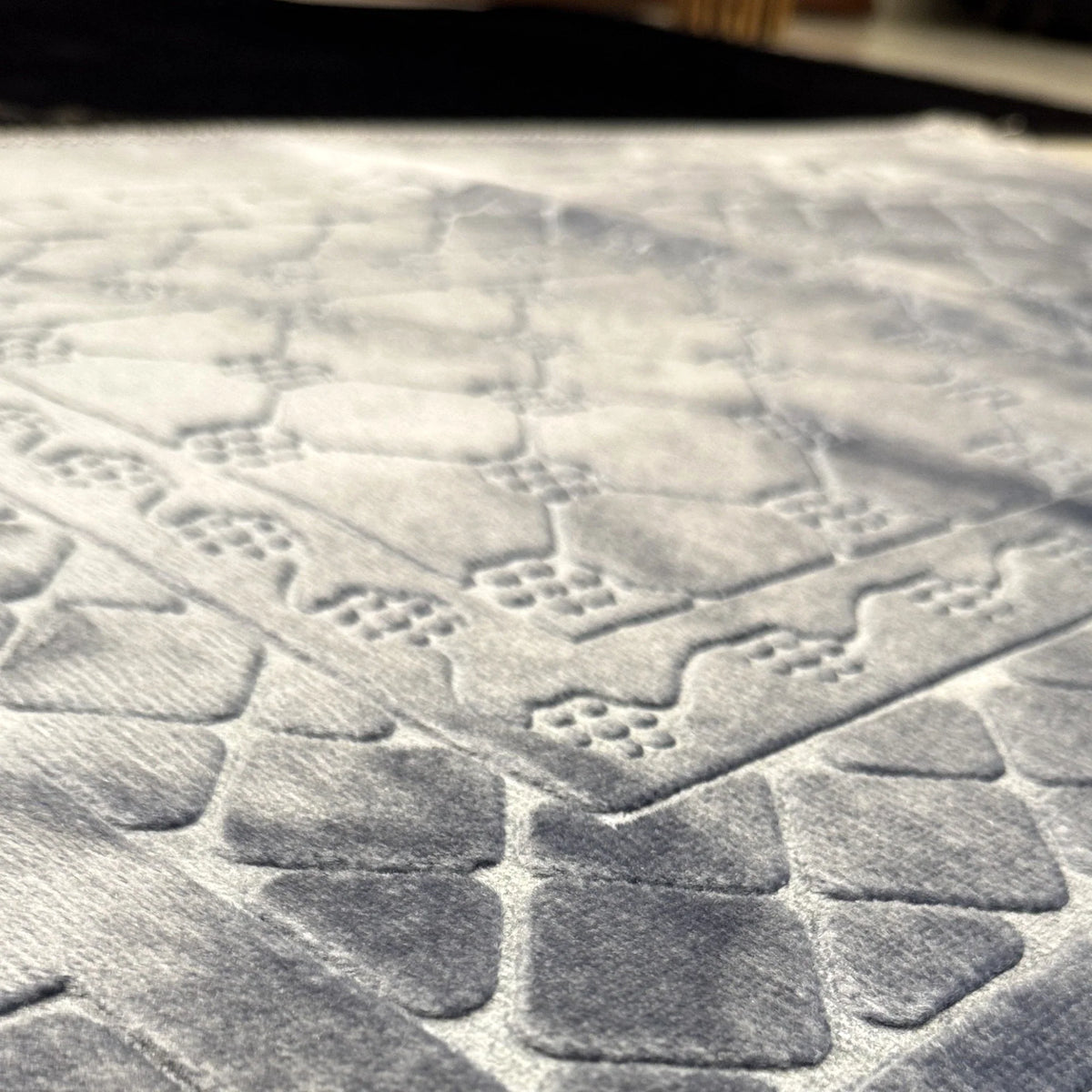 Detailed texture of the grey Rectangle Couple Prayer Mat showing soft, embossed pattern. Elegant and durable for daily prayer use.