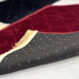 Underside of Black & Maroon Dome Couple Janamaz showing anti-slip dotted backing, combining comfort and safety in designer prayer mats.