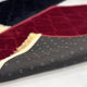 Underside of Black & Maroon Dome Couple Janamaz showing anti-slip dotted backing, combining comfort and safety in designer prayer mats.