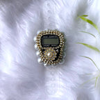 Close-up of Pearl Digital Tasbeeh in gold and white with pearl accents, a handmade digital tasbeeh counter for ceremonial use.