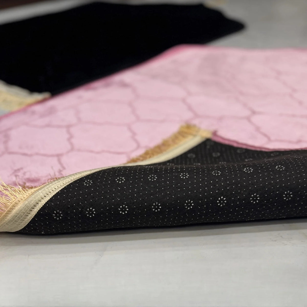 Close-up of Black & Pink Dome Couple Janamaz showing anti-slip backing and soft velvet texture, ideal for daily prayer use.