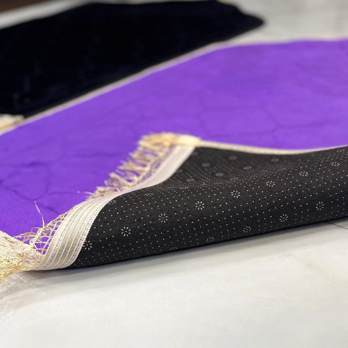 Underside view of Dome Couple Janamaz Mats showing anti-slip backing and fine craftsmanship, ideal for daily prayers.