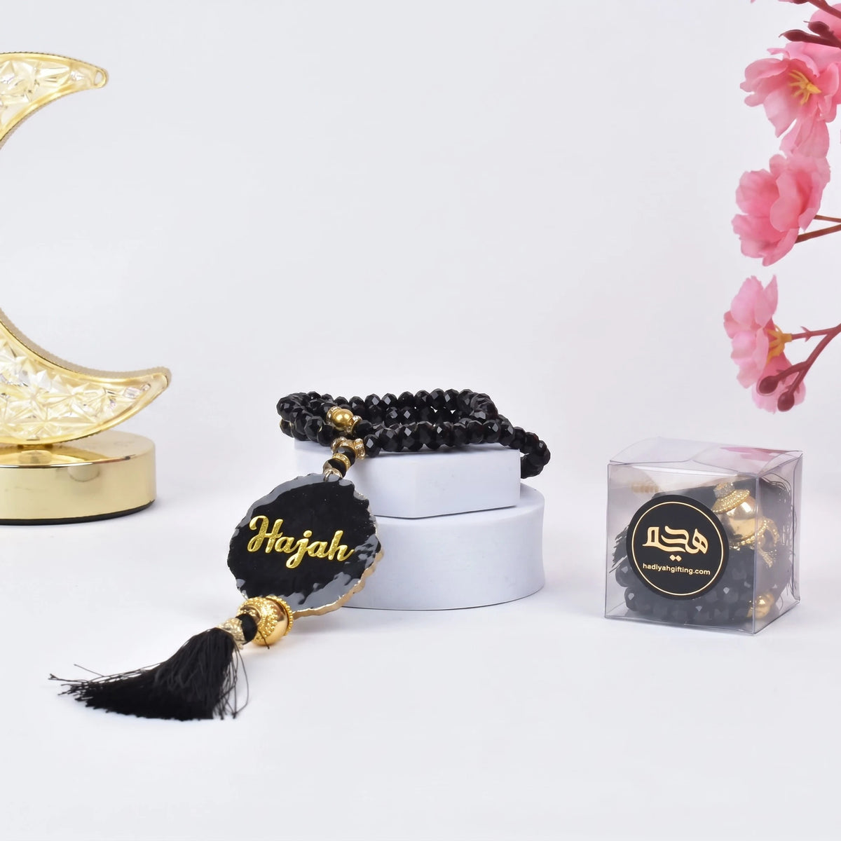 Black Crystal Tasbeeh with Name - 100 Beads displayed on a white box with gold accents, ideal handmade Islamic gift for Ramadan or Eid.