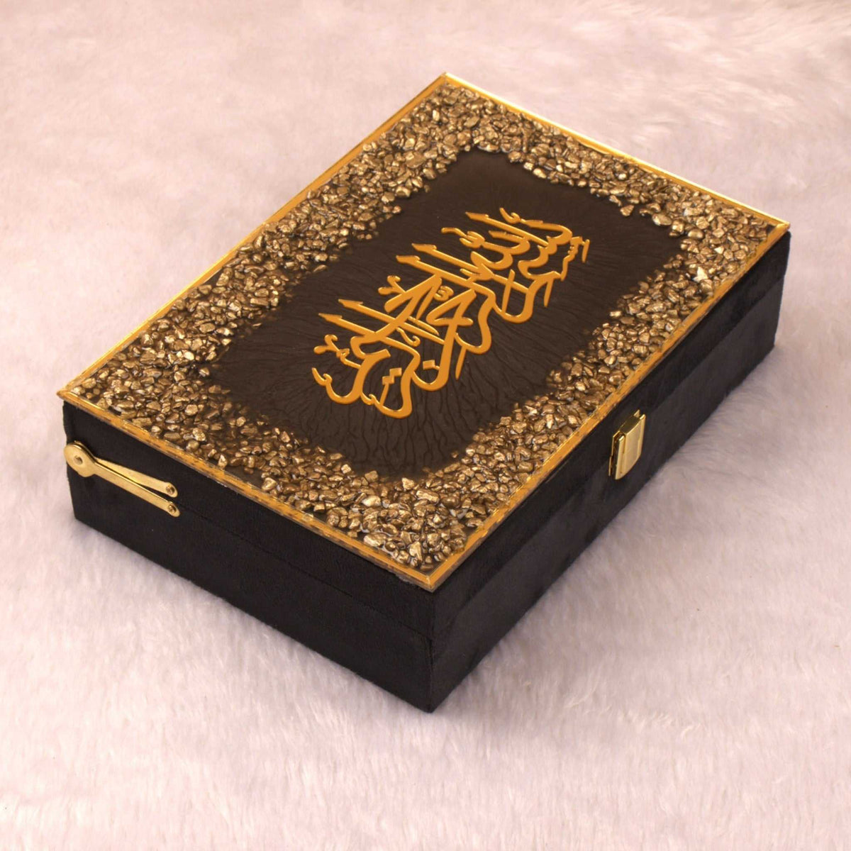 Closed Black Stones Rehal Hamper box with golden Arabic calligraphy and stone detailing, perfect for premium Quran gift set presentation.