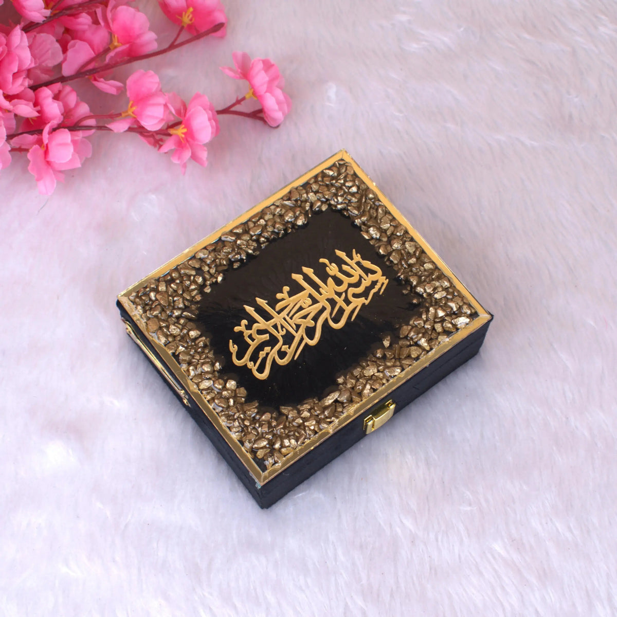 Closed designer box with gold Arabic calligraphy and black stone accents, housing the Mini Quran Gift Set. Premium handmade religious gift from India.
