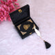 Mini Quran Gift Set in black velvet with gold detailing, displayed in an open designer box with feather bookmark. Handmade in India, ideal for gifting.